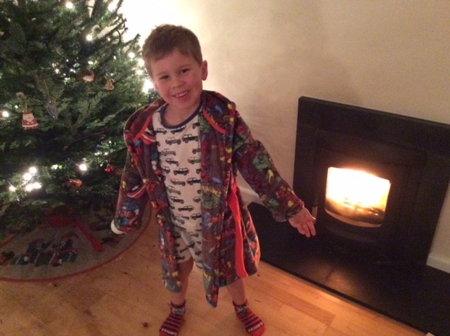 James in front of Xmas ree