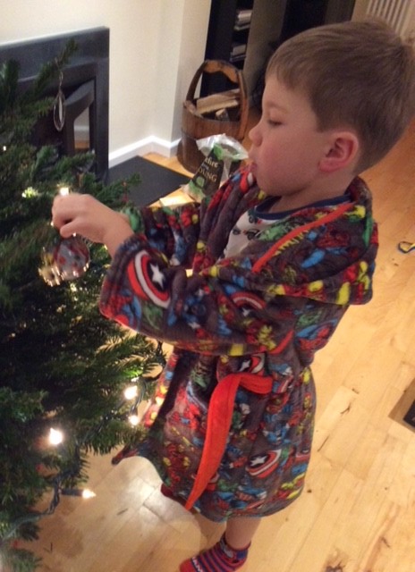 James decorating Xmas Tree