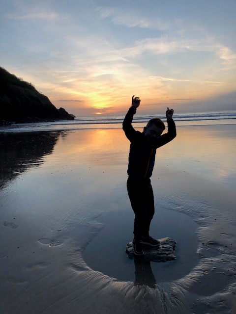 James on beach at sun set