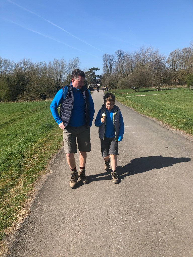 father and son walking